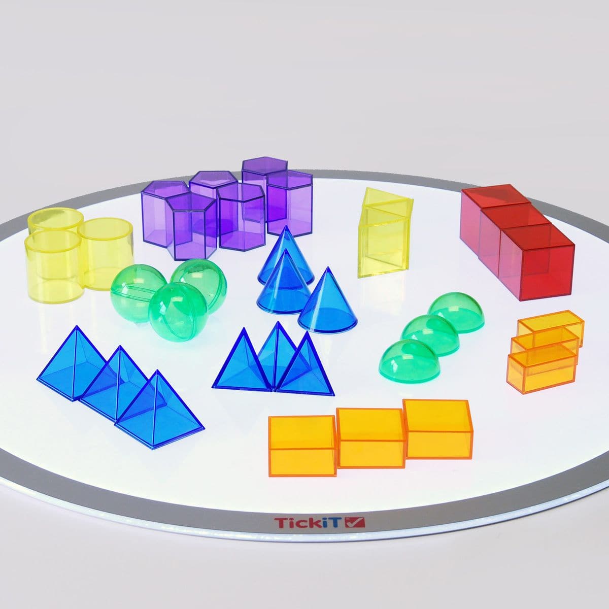 Translucent Geometric Shapes, The Translucent Geometric Shapes are a pack of 12 different shapes and 6 colours. The Translucent Geometric Shapes are ideal for learning shape names and attributes using a light panel. Translucent Geometric Shapes come in a convenient storage container perfect for storing away after use. Introduce a new dimension to your educational or playtime activities with the Translucent Geometric Shapes pack. Comprising 12 different shapes in 6 vibrant colours, this set brings learning t