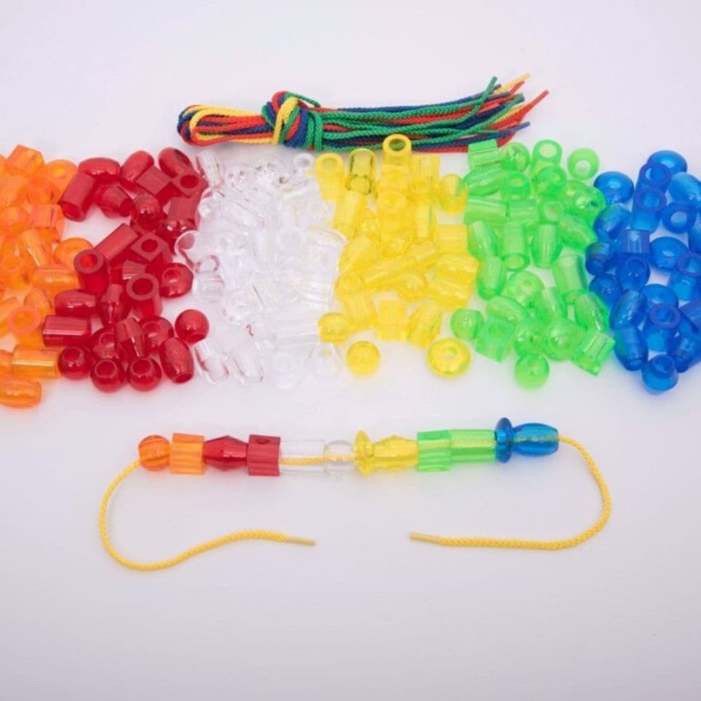 Translucent Jumbo Lacing Beads Set of 180 with 12 Laces, Bumper pack of translucent plastic lacing beads in 6 shapes and 6 colours with 12 laces. Use the Translucent Jumbo Lacing Beads Set for colour and shape recognition, fine motor skills, pattern and sequencing, or sorting and counting. The Translucent Jumbo Lacing Beads Set comes in a convenient storage container. Supports the following areas of learning: Physical Development - motor skills Understanding the World - colour Maths - counting & sorting Mat