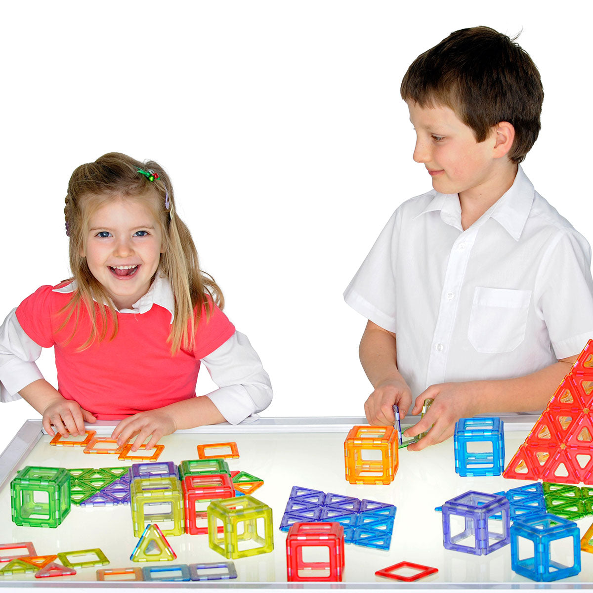 Translucent Magnetic Polydron Class Set, The Translucent Magnetic Polydron Class Set is an innovative and visually captivating educational tool designed to enhance children's creativity and spatial awareness. With this set, children can easily create stunning 2D and 3D shapes on a lightbox, allowing their imagination to shine. This set includes a total of 128 pieces, consisting of 48 squares and 80 equilateral triangles. To help children get started, a helpful poster is included, providing guidance and insp