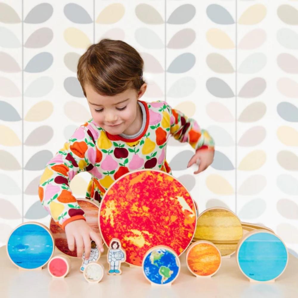 Travelling in Space, Children will love to explore more of our universe and take a trip into space. This beautifully illustrated Travelling in Space solar system set also comes with both a male and female astronaut, as well as their rocket ship. Perfect for imaginative play as well as a great conversation starter to introduce interesting facts about space exploration and the planets that orbit our sun. 12 piece solar system set. Includes: Sun, Mars, Mercury, Venus, Uranus, Earth, Saturn, Jupiter, Neptune, a