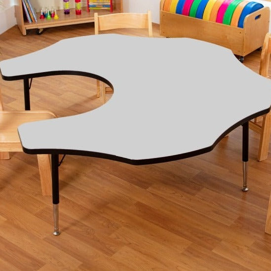 Tuf-Top Height Adjustable Teacher's Flower Table - Heavy Duty, These high quality Teacher's flower shaped adjustable height tables, classroom tables are suitable for heavy duty use with a sturdy 25 mm thick tough table top. Flower shaped table top: 1525 mm diameter Height is adjustable in 25 mm increments from 430 mm to 635 mm, suitable for ages up to 11 years Heavy duty suitable for severe school use Hard-wearing and easy to clean table tops are available in two colours: blue or red Black powder coated (EP
