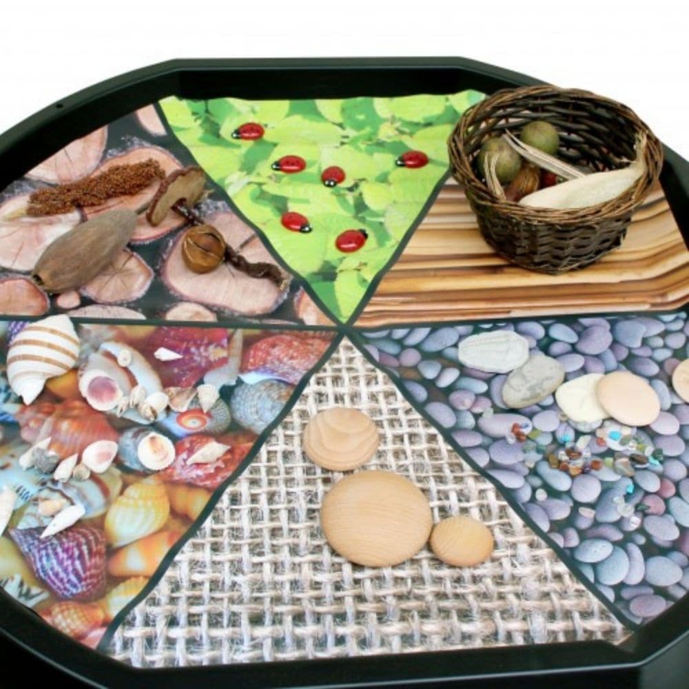 Tuff Tray Insert Natural Textures Insert, Introducing the Tuff Tray Insert Natural Textures Mat, an exciting addition to our new range of vinyl mats designed to transform your Tuff Tray into a unique and engaging learning area. Crafted with care, this mat invites children to explore the fascinating world of natural textures both indoors and outdoors. Tuff Tray Insert Natural Textures Insert Features: Perfect Fit: This Natural Textures mat is meticulously crafted to perfectly fit the Tuff Tray, creating an i