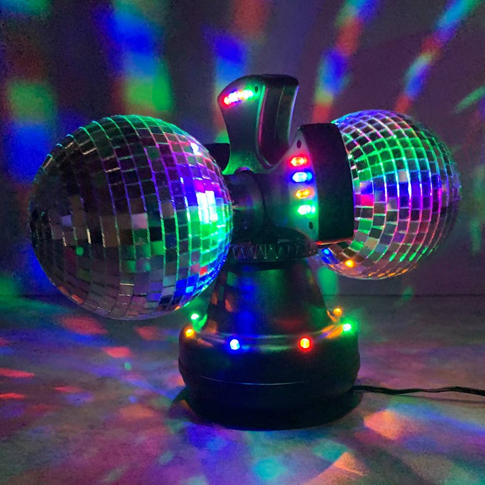 Twin Disco Ball in Black, Give your Children the greatest light show on earth with these twin rotating disco balls! A stunning light effect which will look great in any dark room or bedroom creating a fantastic sensory focus in the room full of colour and light. This compact gadget is a party that you can move around. It has two rotating mirror balls, measuring 10 cm each. These reflect multi-coloured LED lights, creating a flurry of colour on your walls! This light is fantastic for house parties (did we me