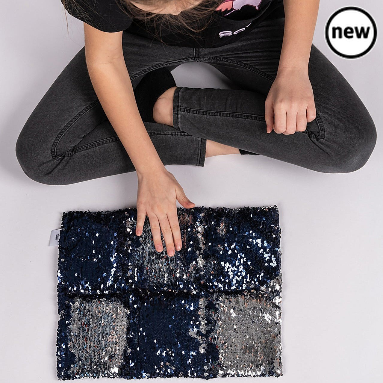Two-Tone Sequin Weighted Lap Pillow, Introducing the Two-Tone Sequin Weighted Lap Pillow—an innovative sensory accessory designed to combine tactile pleasure with deep-pressure input for a calming and engaging experience. Key Features: Dual-Sided Design: One side features captivating two-tone sequin fabric in navy blue, black, or pink, providing visual and tactile stimulation. The other side offers the calming effect of weighted pressure. Compact Size: With dimensions of 40cm x 30cm, this lap pillow is conv