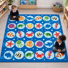 Under the Sea Placement Carpet – two children using the 30-placement carpet