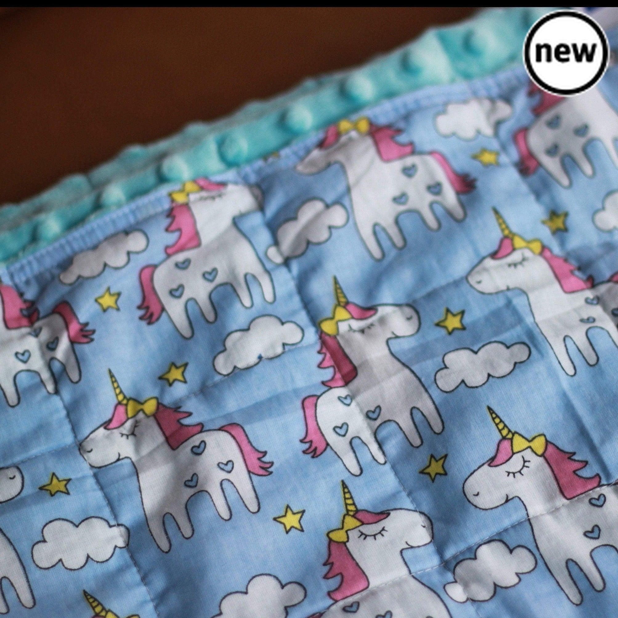 Unicorns Cotton Weighted Blanket, Introducing our Unicorns Cotton Weighted Blanket – a magical blend of comfort and individuality. Handmade from start to finish, this 100% unicorns cotton weighted blanket offers a personalized touch to meet your unique preferences. With customizable options for size, weight, filling, and backing fabric, it's your very own creation designed for all age groups. Key Features: Handmade Excellence: Immerse yourself in the enchanting world of unicorns with our entirely handmade w