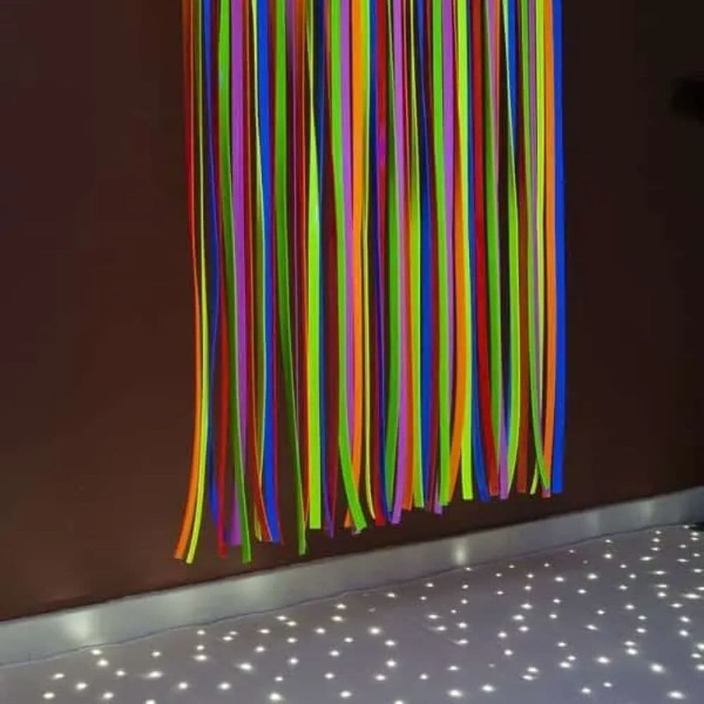 UV Sensory Waterfall, The UV Sensory Waterfall is a wall mounted waterfall which produces an amazingly bright glowing effect when used with a UV light. Even under everyday white light the colours radiate much more intensely than competing products. The UV Sensory Waterfall is created from strips of stretchy PVC, the Waterfall stimulates the visual senses whilst also providing a great tactile experience. We have also incorporated a unique cantilever mounting bracket, allowing for secure fixing and much more 