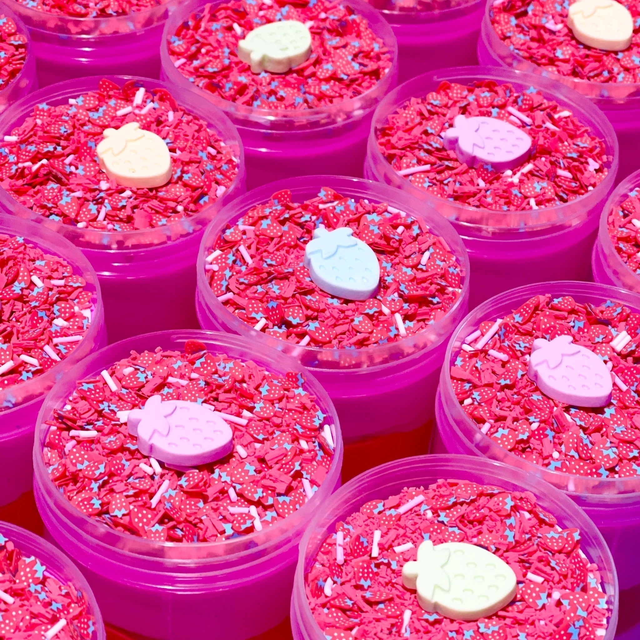 Very Squishberry Putty, Our Very Squishberry putty has three tiers of vibrant pink and red putty, topped with adorable strawberry sprinkles, pastel pink and white floam balls and a strawberry charm to top it off! Putties are air reactive and will dry out of left out. Always return to the container after play with the lid tightly on. Keep away from direct sunlight. Keep away from fabrics and porous surfaces. Container Size: 275ml Ages 5+, Adult supervision recommended. Very Squishberry Putty Washing hands th
