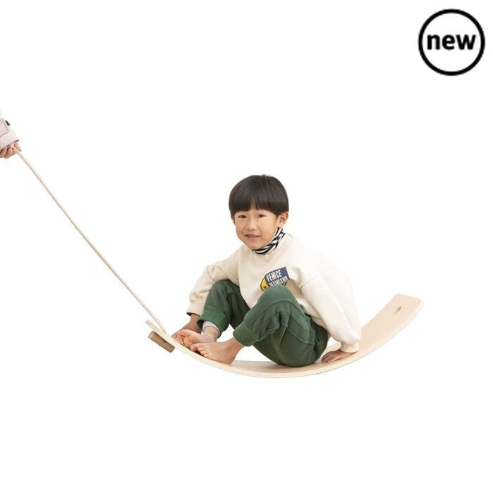 Wooden Balancing Board, Our Waldorf-inspired Wooden Balancing Board will stimulate both balance and strength. With its curved design, the Wooden Balancing Board can be used as both a rocker, supporting physical development, stability and core strength and also as a bridge or ramp when turned over. With the pull rope, child can sit on the balance board and be dragged along. It can be a seesaw, racing car track, surfing board, rocking ship, a bed, a bridge, a slide and so on. Use your imagination to unlock mo