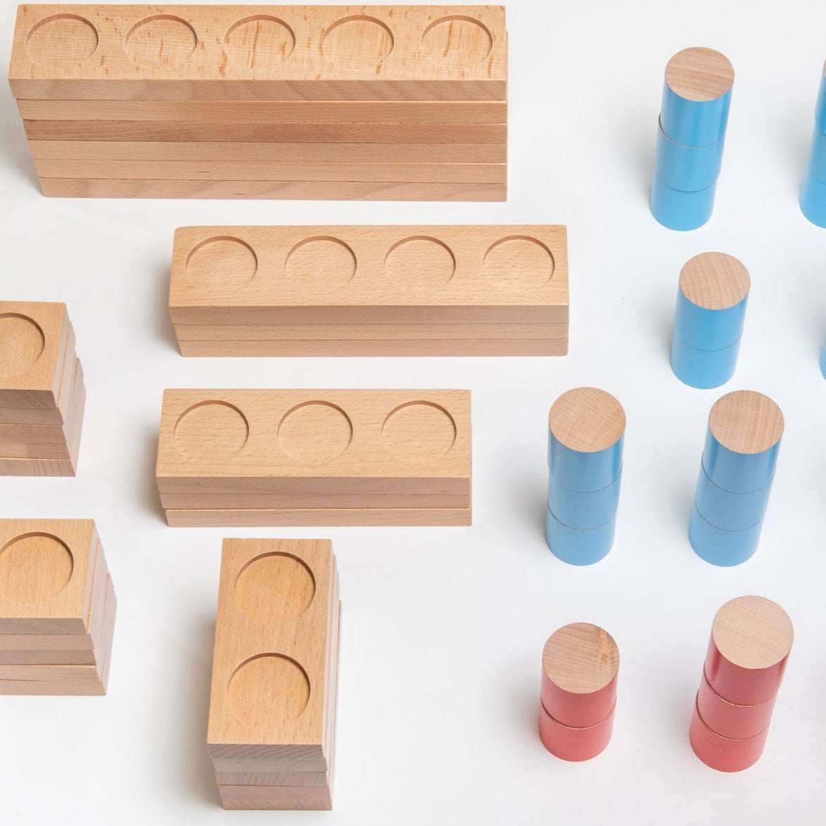 Wooden Counting Blocks, The wooden counting set is the perfect tool for early childhood mathematical education. The set includes a variety of bases that can be arranged in different ways to support learning addition, subtraction, number bonds and ten frame work. The bases can be positioned side by side, stacked on top of each other or arranged in any order to create a unique learning experience.Made from FSC® Certified Beech Wood, each piece in the set is durable and long-lasting. The set includes 40 counte