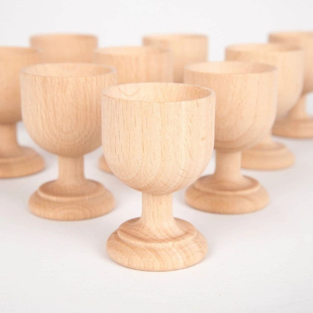 Wooden egg cups pack of 10, The word heuristic derives from the Greek word “eurisko” meaning “I discover” and describes an intuitive way of meeting challenges and solving problems. Enable your child to discover the wonders of learning through play with our TickiT® Beechwood Egg Cups - an essential part of our heuristic play range. These simple and curious natural smooth wooden egg cups will spark your child's imagination and encourage them to explore ways to incorporate them into imaginative play and learn 