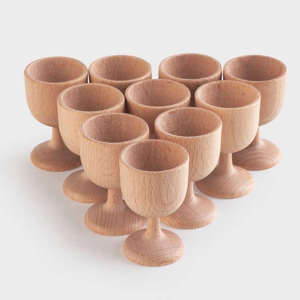 Wooden egg cups pack of 10, The word heuristic derives from the Greek word “eurisko” meaning “I discover” and describes an intuitive way of meeting challenges and solving problems. Enable your child to discover the wonders of learning through play with our TickiT® Beechwood Egg Cups - an essential part of our heuristic play range. These simple and curious natural smooth wooden egg cups will spark your child's imagination and encourage them to explore ways to incorporate them into imaginative play and learn 