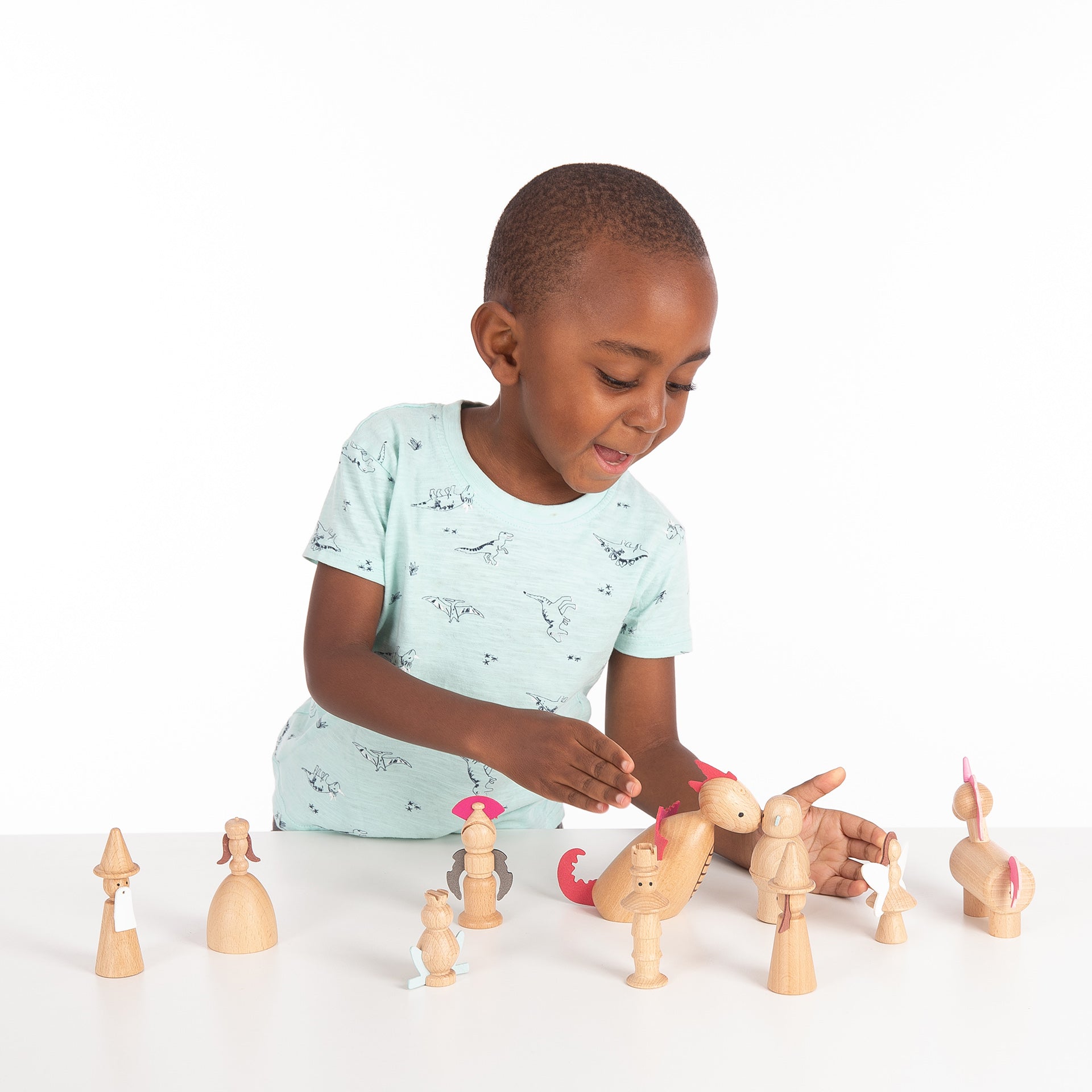 Wooden Enchanted Figures, Your child will love creating their own magical fairy tale with our TickiT® Wooden Enchanted Figures. A spellbinding set of 10 characters from traditional fairy stories made from beautiful solid beechwood, including a king, queen, witch, wizard, fairy, knight, dragon, unicorn, frog-prince and ogre. Natural and smooth with simple printed features and faux leather embellishments, these charming figures are fun and tactile. Your child can use them in imaginative play, small world play