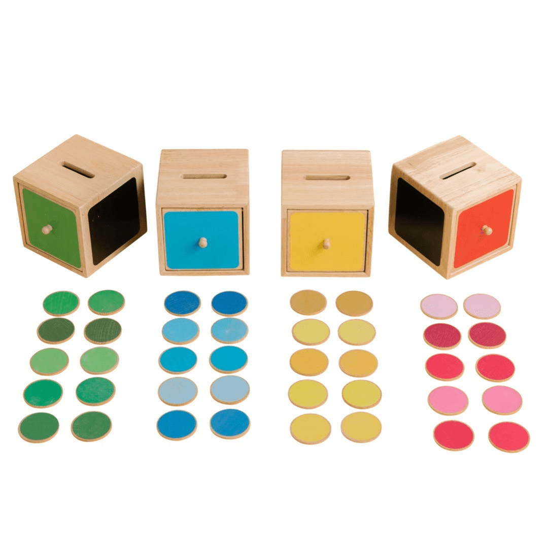 Wooden Post Sort ’n’ Play, Introducing our 44 piece interactive scene set, perfect for open-ended play and early learning skills development. The set includes 4 generously sized boxes, each with a different coloured door and 40 discs in an array of shades to match. The discs feature a chalkboard side and a coloured side, offering endless opportunities for learning and creativity.With their bright colours and unique design, these boxes are ideal for children who love to explore, count, and match. They're per