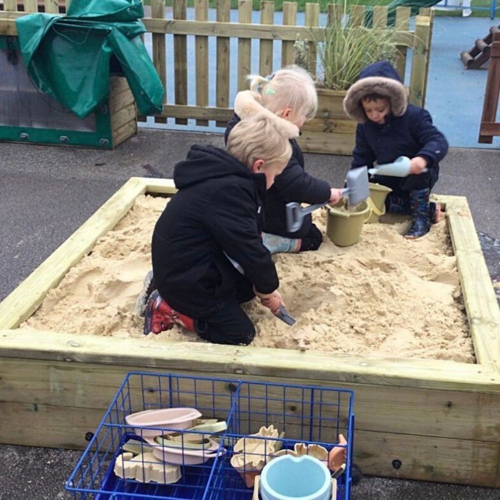 Wooden Sandpit with PVC Cover, This outdoor wooden sandpit is a great addition for any school playground, nursery or garden. Children can dig, build and sieve the sand to learn values of textures and weights and measures.The Wooden Sandpit with PVC Cover is an age-old resource, the sandpit is a great place for children to develop social skills and interaction too. Made from FSC Pressure Treated Redwood Timber. (Sand not included) Delivery 3-4 weeks Delivered fully assembled FSC Pressure Treated Redwood Timb