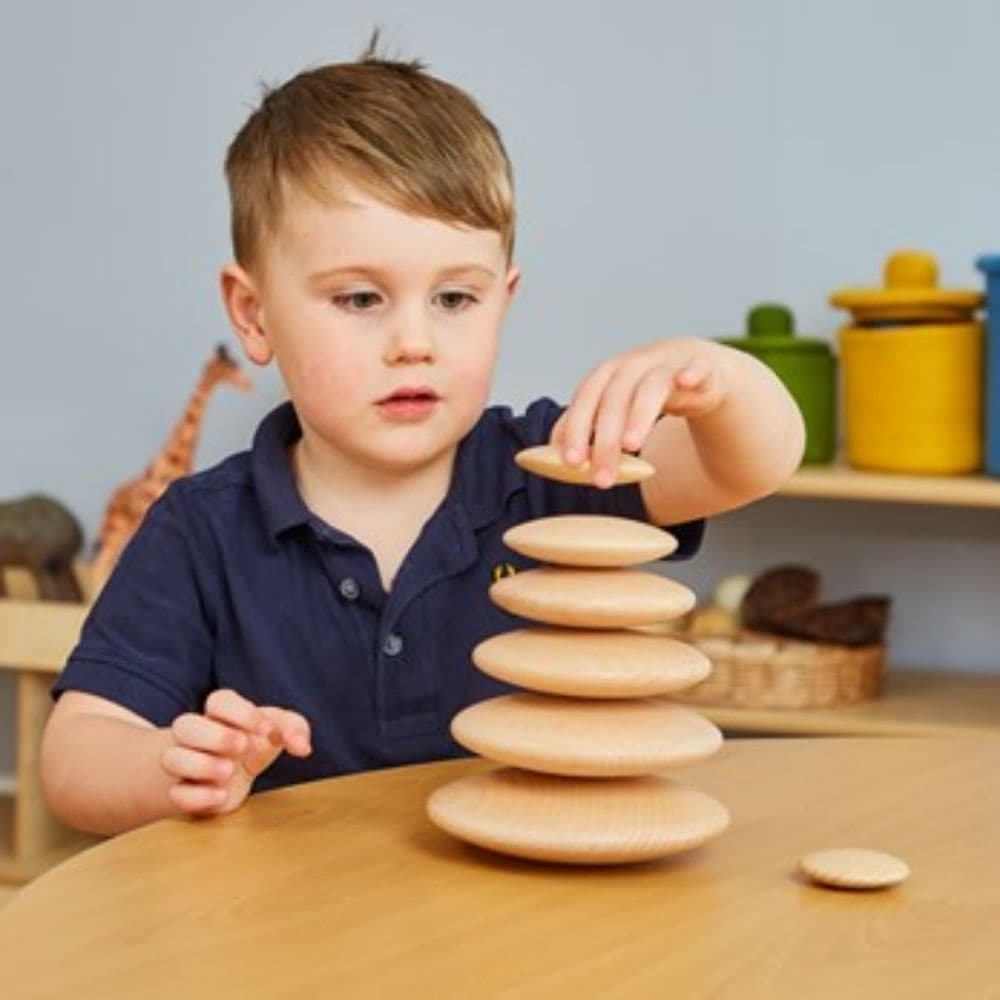 Wooden Stacking Pebbles, Carefully stack and balance the smooth wooden stacking pebbles before they tumble down! The play possibilities are endless with this versatile stacking pebbles toy, with no guidelines or rules, creative youngsters can stack the pebbles in as many ways as they can find. But, can you keep them balanced! Once playtime is over, the Wooden Stacking Pebbles make a fun decoration for your little ones bedroom or nursery. Develops creativity, dexterity and spatial reasoning skills. The Woode