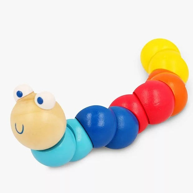 Woodie the worm - Blue, You will love our Woodie Worm character in Blue. Woodie Worm is a jointed worm made of wood and painted in lots of lovely bright and appealing colours with a happy face. Woodie Worm will provide hours of bending and twisting and makes a fun fidget toy for your fiddlers and fidgets.The woodie worms will support a child's hand eye coordination, fine motor skills, learning about minibeasts, things that move, colours understanding the world. Woodie the worm helps to keep them occupied, d