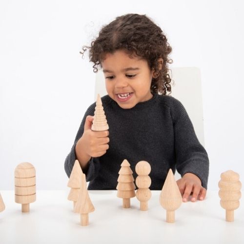 Woodland Trees Set - Pk10, Our TickiT® Wooden Woodland Trees are made from beautiful smooth solid beechwood with a natural woodgrain finish. In a range of different shapes, designs and sizes, the Woodland Trees Set is ideal for small world play, learning about the importance of trees in our ecosystem, identifying similarities and differences and for developing language and communication skills. The Woodland Trees Set is perfect for your child to use their imagination during imaginative play, improve countin